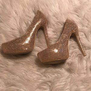 Gold sparkly high heels